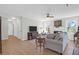 Spacious living room with a fireplace, ceiling fan and ample natural light at 1142 Village Creek Ln # 3, Mount Pleasant, SC 29464