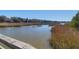 Scenic marsh view from the wooden dock featuring tall reeds and calm waters at 1142 Village Creek Ln # 3, Mount Pleasant, SC 29464