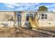 Rear exterior featuring a sliding glass door with steps, a small air conditioning unit, and lots of outdoor space at 116 Wisteria Falls Trl, Saint Stephen, SC 29479