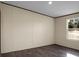 Bedroom boasts dark wood-look floors and a window with a view at 116 Wisteria Falls Trl, Saint Stephen, SC 29479
