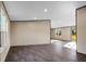 Bright living room offering an open-concept design with wood flooring and ample natural light, creating a welcoming atmosphere at 116 Wisteria Falls Trl, Saint Stephen, SC 29479