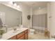 Clean bathroom featuring a vanity, toilet, shower with curtain, and neutral decor at 1204 Dingle Rd, Mount Pleasant, SC 29466