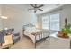 Comfortable bedroom featuring a bed, chair, desk, and natural light from the window at 1204 Dingle Rd, Mount Pleasant, SC 29466