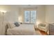 Cozy bedroom with neutral tones, a large window, and comfortable furnishings at 1204 Dingle Rd, Mount Pleasant, SC 29466