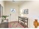 Welcoming foyer with hardwood floors, a console table, and a decorative rug at 1204 Dingle Rd, Mount Pleasant, SC 29466