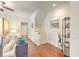Bright hallway with hardwood floors, decorative accents, and easy access to other rooms at 1204 Dingle Rd, Mount Pleasant, SC 29466