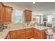 Well-equipped kitchen featuring granite countertops, stainless appliances, and wooden cabinets at 1204 Dingle Rd, Mount Pleasant, SC 29466