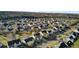 Scenic aerial view of a residential community, highlighting a pond, mature trees and attractive landscaping at 138 Back Tee Cir, Summerville, SC 29485