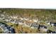 Neighborhood aerial featuring well-kept homes, mature trees, and solar panels adding a modern touch at 138 Back Tee Cir, Summerville, SC 29485