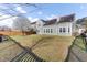 Spacious, well maintained backyard features an expansive lawn and concrete patio at 138 Back Tee Cir, Summerville, SC 29485
