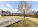 Fenced in backyard boasting a large grassy area and a concrete patio at 138 Back Tee Cir, Summerville, SC 29485