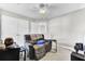 Bedroom view with a comfortable reclining chair and entertainment setup at 138 Back Tee Cir, Summerville, SC 29485