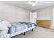A view of a carpeted bedroom with dresser and bed at 138 Back Tee Cir, Summerville, SC 29485