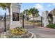 Elegant gated community entrance with lush landscaping and security features providing exclusivity and peace of mind at 138 Back Tee Cir, Summerville, SC 29485