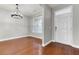 Dining room with hardwood floors, natural light, and chandelier that complement the home's design at 138 Back Tee Cir, Summerville, SC 29485