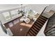 Aerial view of the living room and kitchen, highlighting the open floor plan and staircase at 138 Back Tee Cir, Summerville, SC 29485