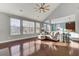 Bright living room with vaulted ceilings, large windows, and hardwood floors at 138 Back Tee Cir, Summerville, SC 29485