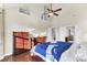 Sunlit main bedroom with vaulted ceiling features hardwood floors and large windows at 138 Back Tee Cir, Summerville, SC 29485