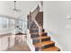 Beautiful staircase with hardwood steps and iron railings leading to the main living area at 138 Back Tee Cir, Summerville, SC 29485