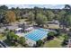 Aerial view of a gorgeous community pool with seating and mature trees at 138 Back Tee Cir, Summerville, SC 29485