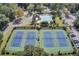 Aerial view of tennis courts and a pool at a beautiful community at 138 Back Tee Cir, Summerville, SC 29485