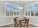 Cozy dining area with natural light and an elegant chandelier at 139 Ancestry Ln, Moncks Corner, SC 29461