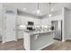 Modern kitchen featuring white cabinets, stainless steel appliances, and a granite island at 139 Ancestry Ln, Moncks Corner, SC 29461