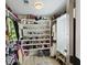 Walk-in closet with custom shelving and ample storage space for clothes and accessories at 1605 Evergreen St, Charleston, SC 29407