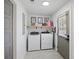 Functional laundry room with modern appliances and ample lighting at 1605 Evergreen St, Charleston, SC 29407