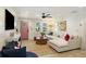 Bright and airy living room with modern furnishings, shiplap walls and an open concept design at 1605 Evergreen St, Charleston, SC 29407