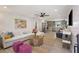 Spacious living room featuring shiplap walls, neutral tones, modern furniture, and an open-concept design at 1605 Evergreen St, Charleston, SC 29407