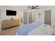 Well-lit bedroom featuring a dresser and doorways to the bathroom and closet at 1605 Evergreen St, Charleston, SC 29407