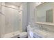 Bathroom featuring a glass-enclosed shower, white marble, and a vanity with marble countertop at 1625 Oak Leaf St, Daniel Island, SC 29492