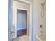 Modern bathroom with white subway tiles in the shower, and neutral-toned tile flooring at 1625 Oak Leaf St, Daniel Island, SC 29492