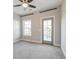 An empty bedroom with carpet flooring and plenty of natural light at 1625 Oak Leaf St, Daniel Island, SC 29492