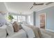 A bright bedroom with lots of sunlight, and large bed at 1625 Oak Leaf St, Daniel Island, SC 29492