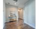 A well-lit entryway with a console table with decor and artwork at 1625 Oak Leaf St, Daniel Island, SC 29492