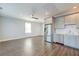 Bright open kitchen featuring stainless steel appliances, gray cabinets, and recessed lighting at 1625 Oak Leaf St, Daniel Island, SC 29492