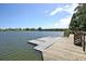 Community lake featuring a floating dock and convenient boardwalk access for lakeside enjoyment at 1625 Oak Leaf St, Daniel Island, SC 29492