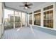 Covered porch with a ceiling fan, offering a relaxing outdoor space at 1625 Oak Leaf St, Daniel Island, SC 29492