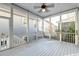 Expansive screened porch offering an ideal space for enjoying the outdoors in comfort and style at 1625 Oak Leaf St, Daniel Island, SC 29492