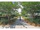 Serene tree-lined walking path offering a peaceful escape through the community at 1625 Oak Leaf St, Daniel Island, SC 29492