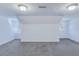 Finished attic area with neutral carpet, and natural light at 1677 French Santee Rd, Jamestown, SC 29453