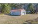 Exterior of large barn with metal siding and red roof at 1677 French Santee Rd, Jamestown, SC 29453