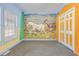 Bright bedroom with an animal-themed mural, and closet adding a playful touch at 1677 French Santee Rd, Jamestown, SC 29453
