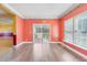 Dining room area features hardwood floors, natural light and sliding glass doors to outdoor patio at 1677 French Santee Rd, Jamestown, SC 29453