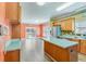 Spacious kitchen with hardwood floors, sliding doors to a porch, and stainless steel appliances at 1677 French Santee Rd, Jamestown, SC 29453