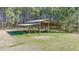 Open barn with multiple bays and supports, providing ample space for parking and storage at 1677 French Santee Rd, Jamestown, SC 29453