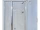 Enclosed shower with glass sliding doors and updated fixtures for a modern, clean look at 1677 French Santee Rd, Jamestown, SC 29453