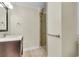 Modern bathroom featuring a glass-enclosed shower with a tiled surround and a vanity with storage at 1723 River Front Dr, Charleston, SC 29407